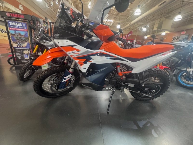 KTM 890 Adventure R side profile showing long-travel WP fork and spoked wheels